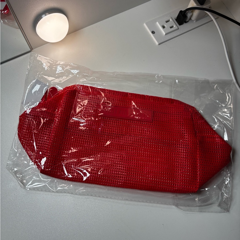 First aid beauty red makeup bag